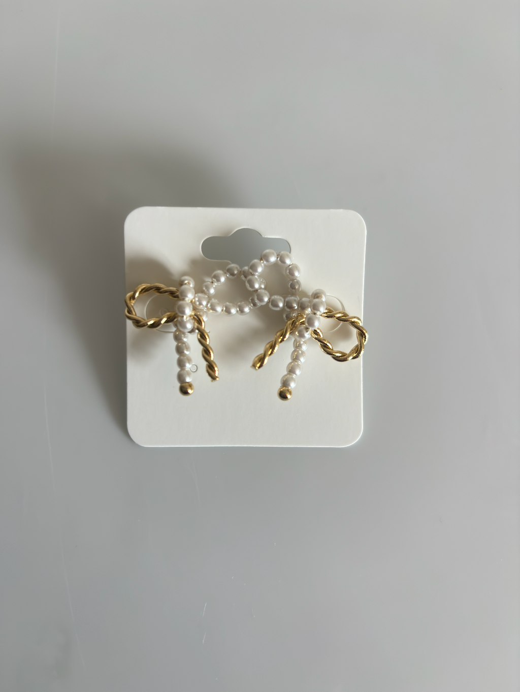 9. Pearly Bow Studs