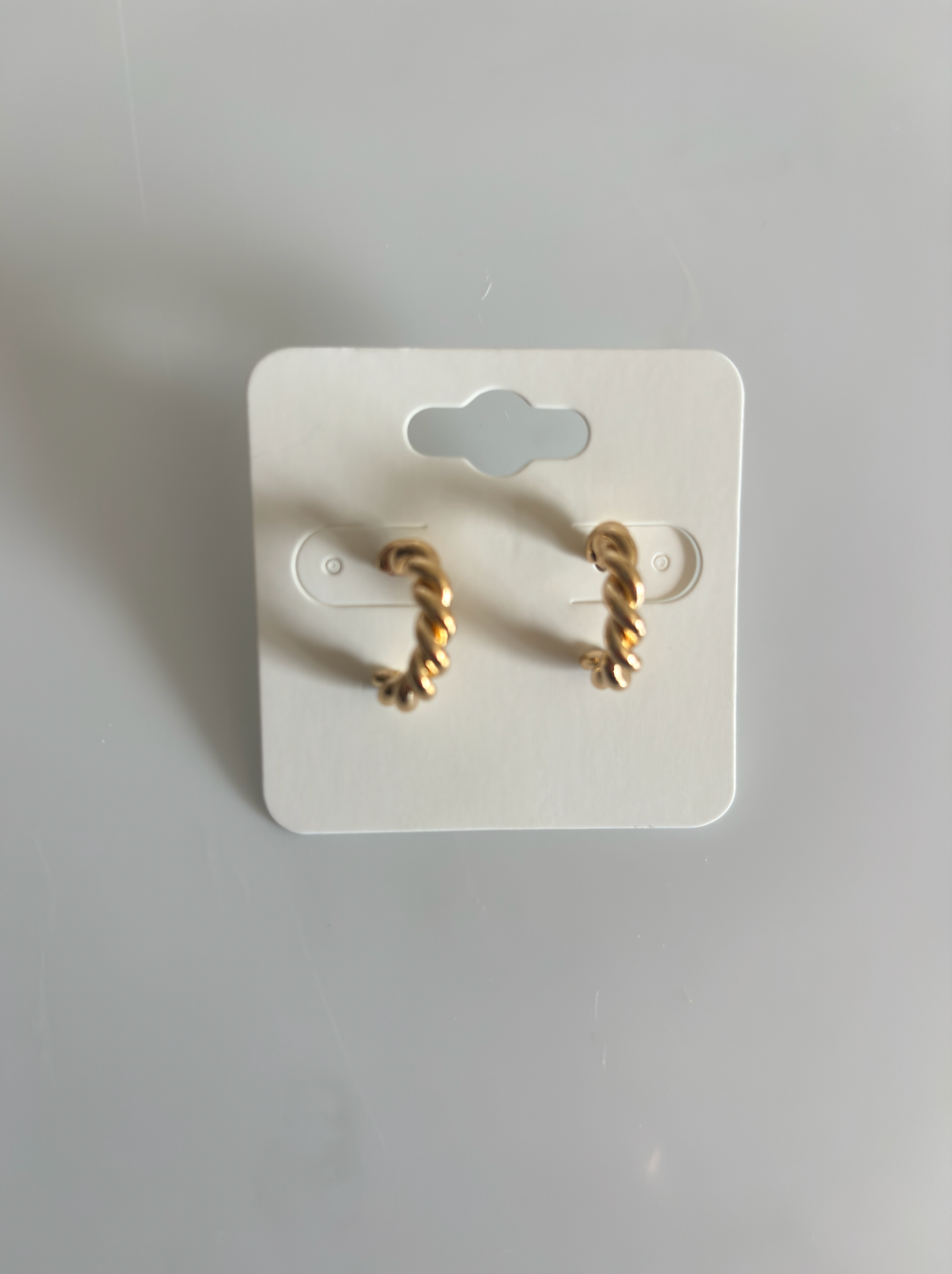 9. Twist Gold Hoops