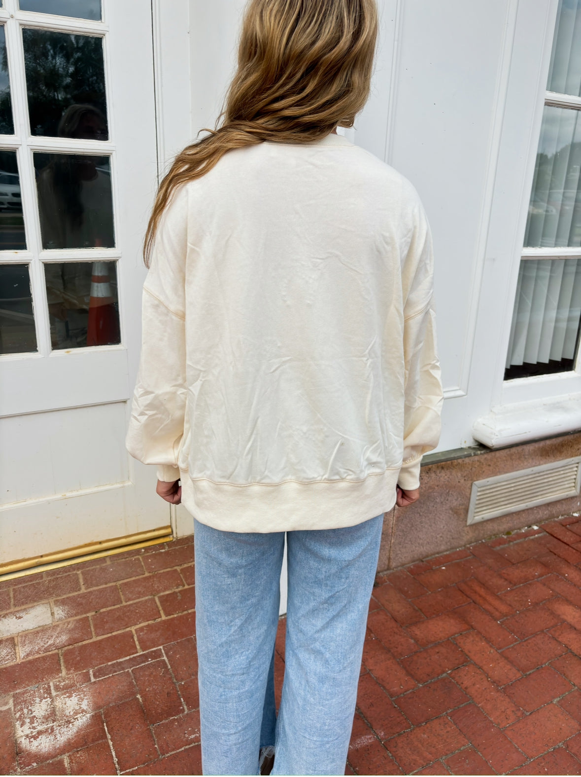 2. Pearly Bow Sweatshirt