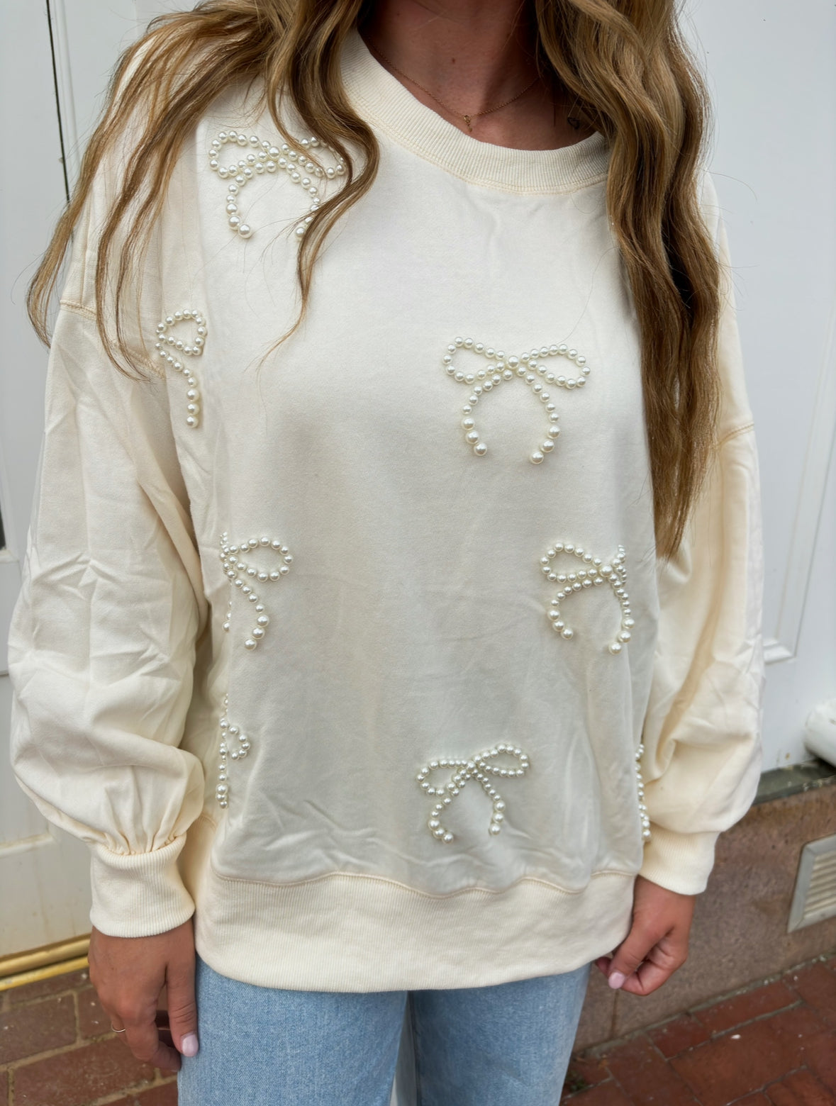 2. Pearly Bow Sweatshirt