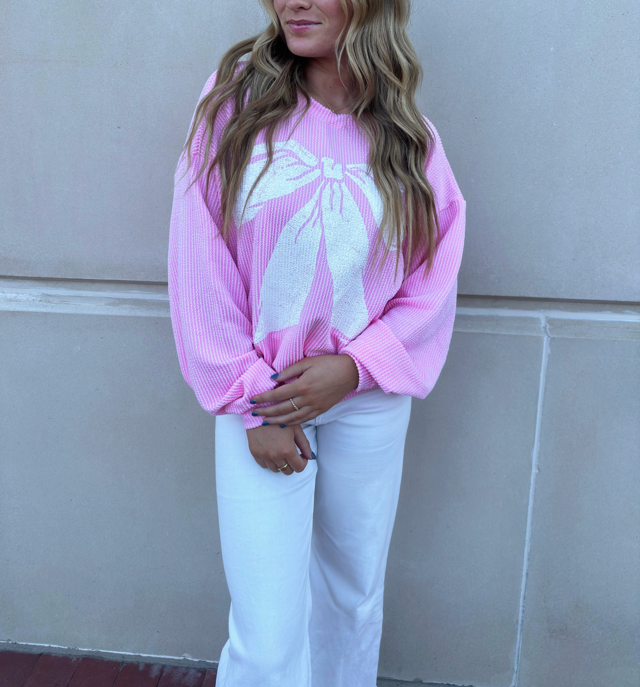 1. Pink Bow Pullover